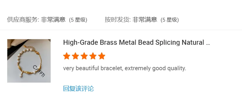 Customer review screenshot showing a pearl-like bead bracelet with gold-tone details.